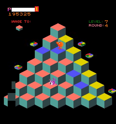 schermata di gioco di q*bert con la piramide di cubi colorati e il protagonista arancione in cima.
