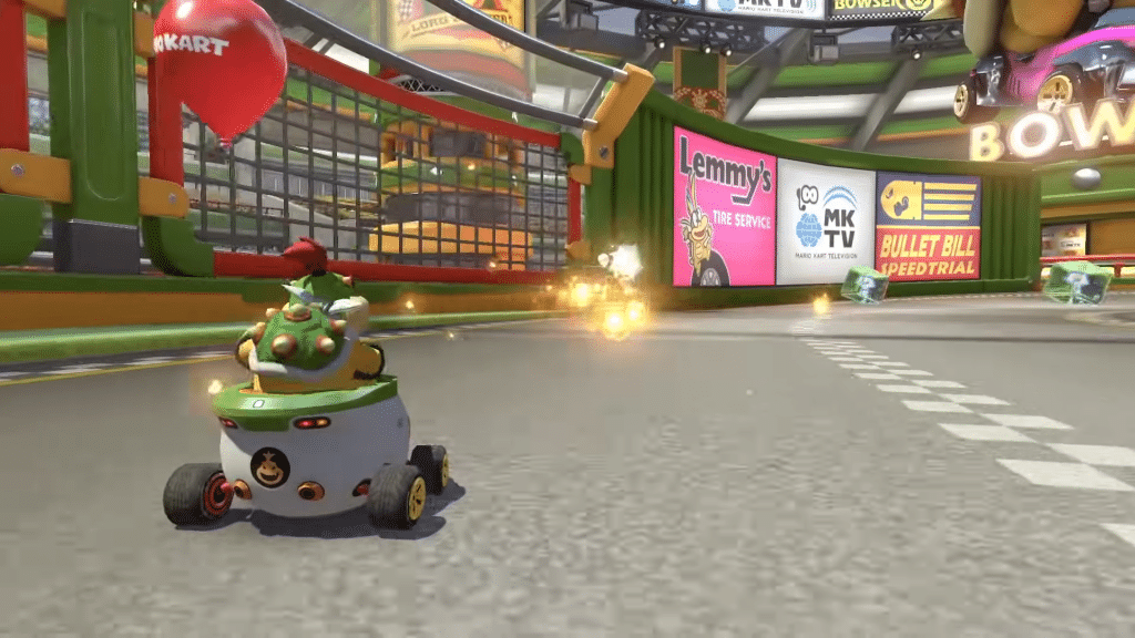 bowser junior in gara nella modalità battaglia di mario kart 8 deluxe.