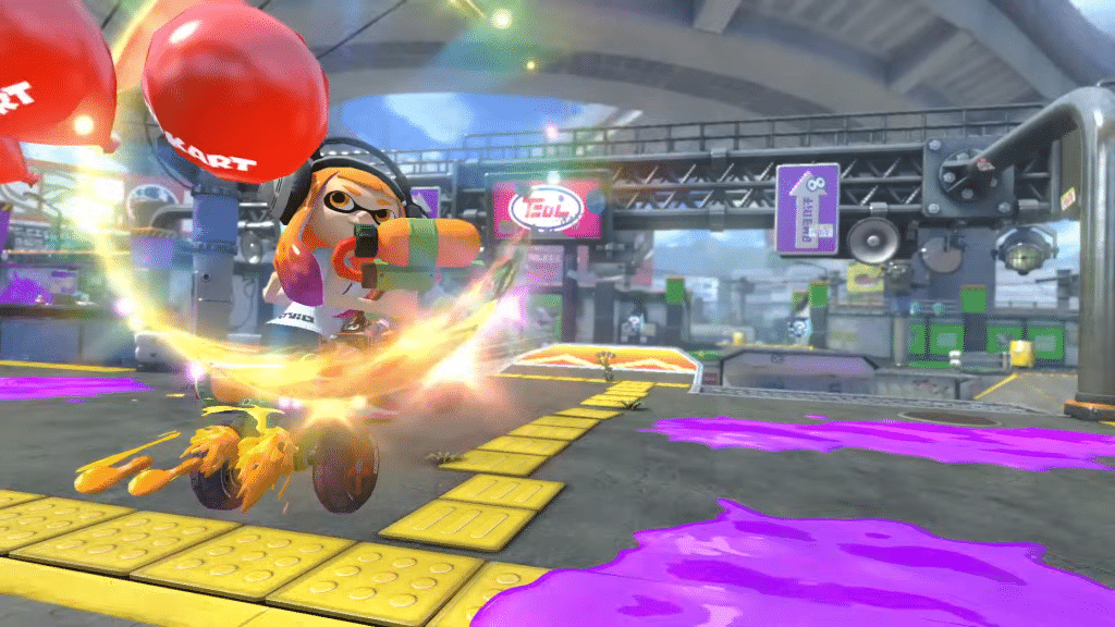 personaggio inkling girl combatte in modalità battaglia con un’arma a inchiostro.